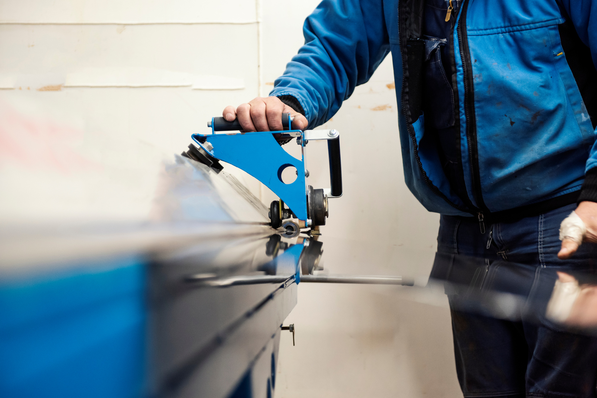 Operator cutting sheet metal